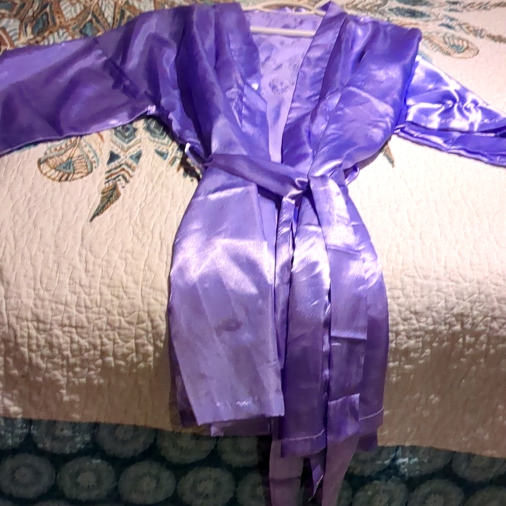 Mother of the bride purple robe.  Wore for two hrs Has a few snags in sleeve,bod